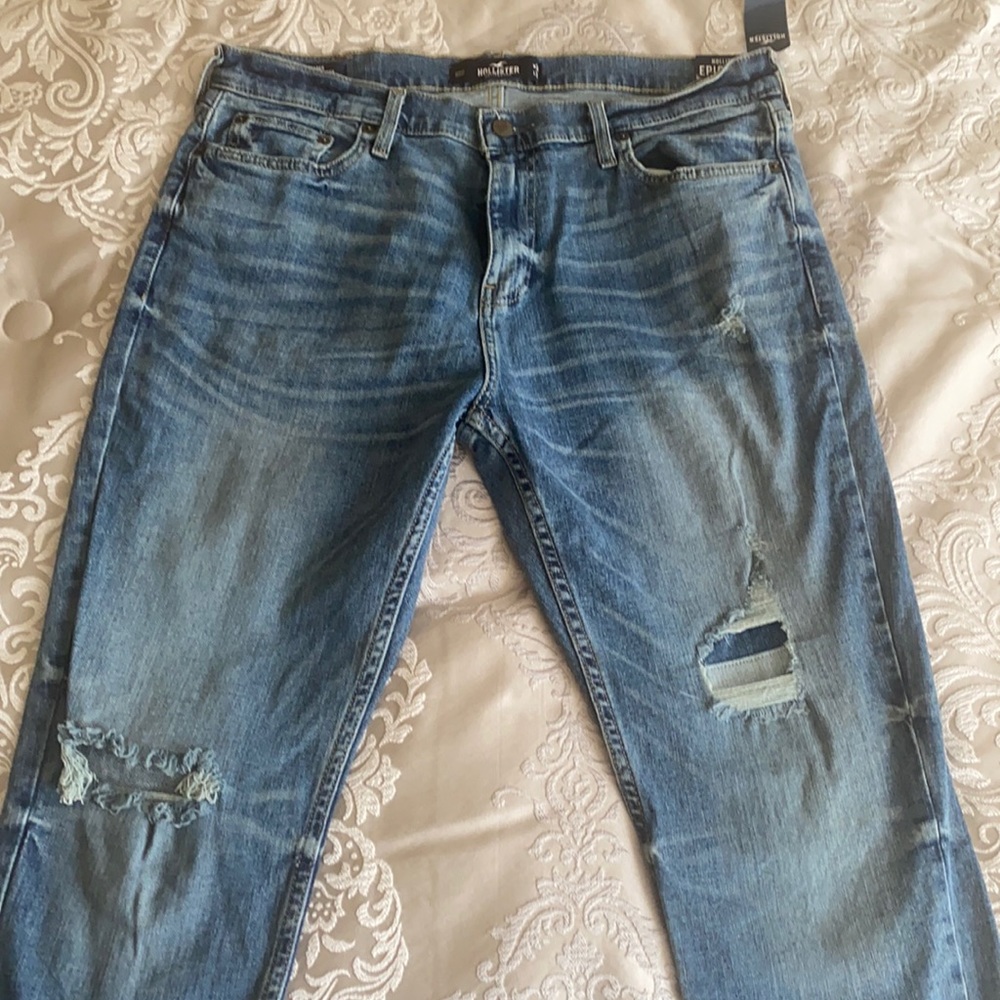 Hollister Men's Straight Jeans in Light Blue Distressed Wash